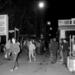 Berliners walk freely through Checkpoint Charlie on the night of the fall of the Berlin Wall