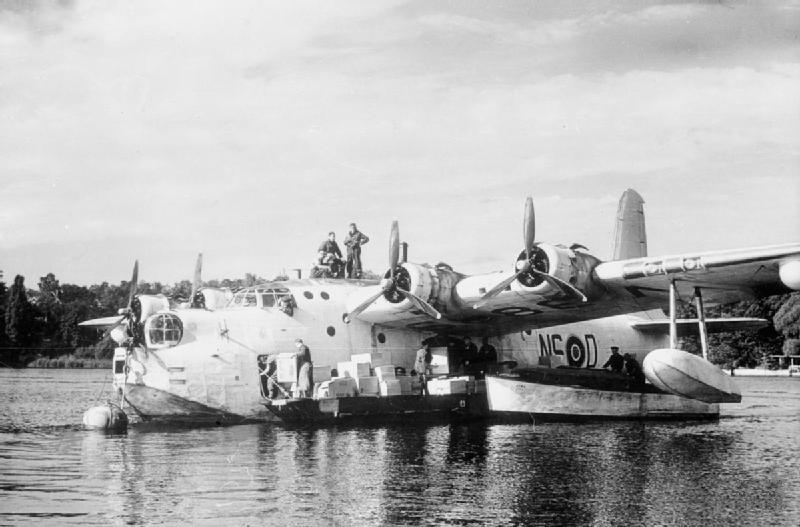 A Sunderland flying boat of 201 Squadron unloading on the Havel during the Berlin Airlift, 1948
