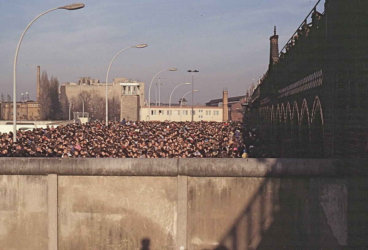 Crowds amass at Oberbaumbrucke after the fall of the Berlin Wall in 1989