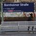Bank und Bahnhofsschild am S-Bahnhof Bornholmer Straße, Berlin-Prenzlauer Berg