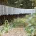 Border fence surrounding Steinstücken railway line, with tank traps